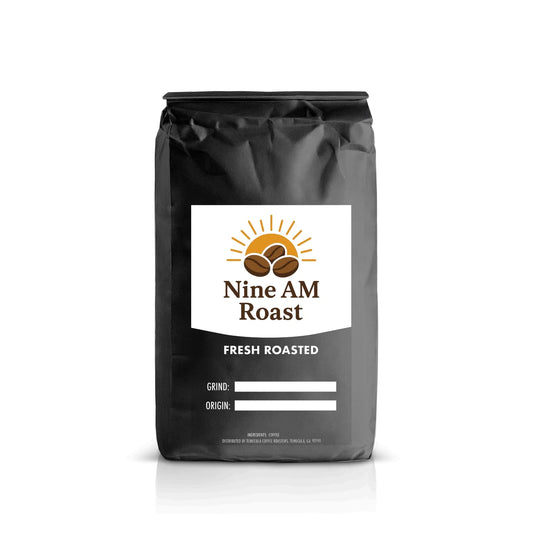 Black coffee bag with a colorful label on a white background - Nine AM Roast
